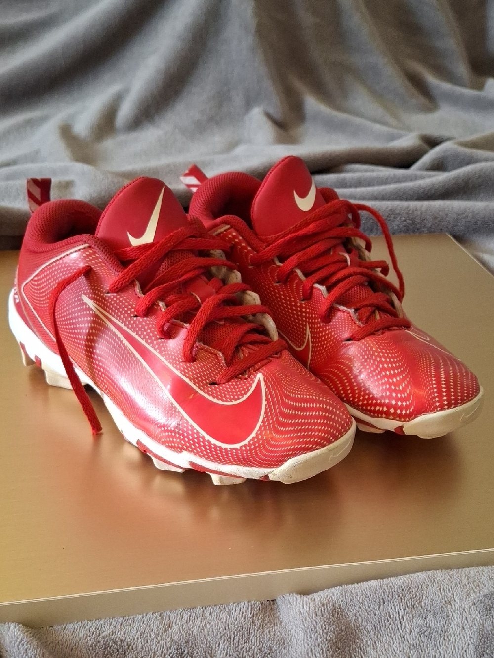 Nike Kids Red Soccer Cleats with White Swoosh